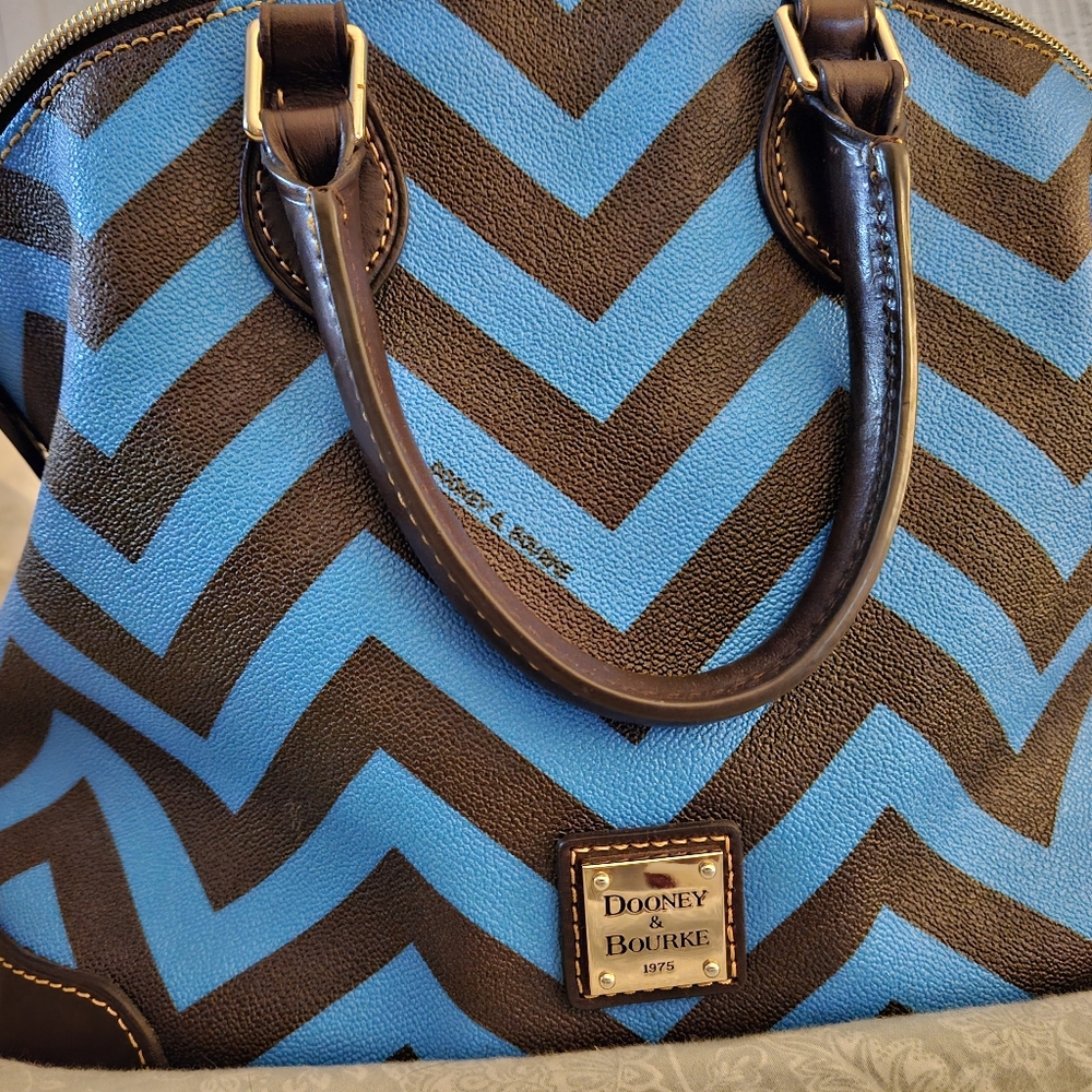 Beautiful Chevron blue and black Dooney and Burke dome shape shachel.